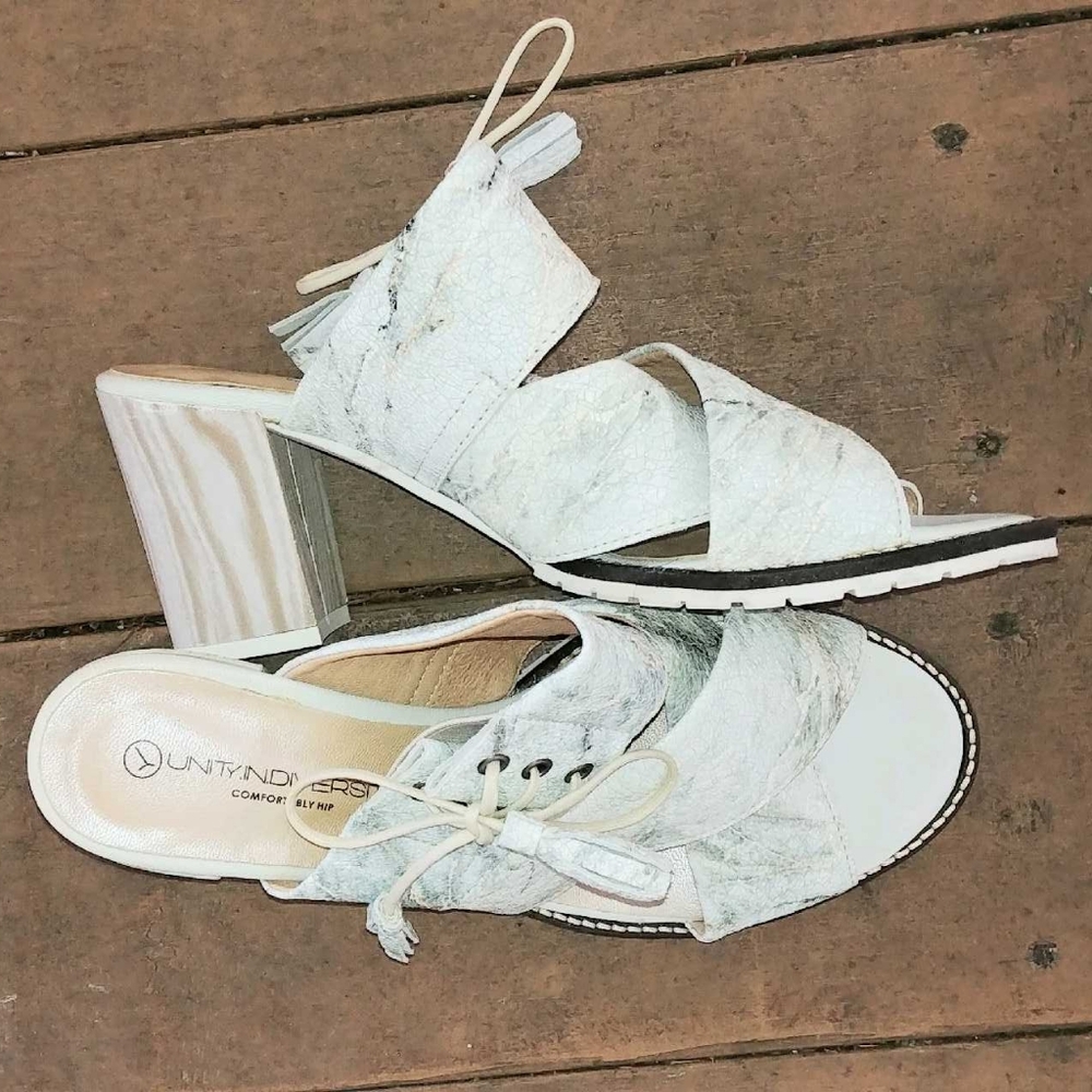Unity in Diversity heeled sandals.